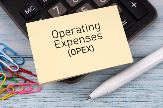 OPEX operating expense text on adhesive note