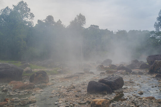 Jae son Hot Spring: Steam from geothermal heat rises from the spring. Located in Jae son National Park, Lampang Province, Thailand.