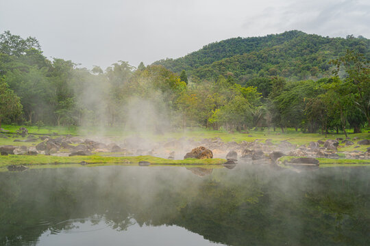 Jae son Hot Spring: Steam from geothermal heat rises from the spring. Located in Jae son National Park, Lampang Province, Thailand.