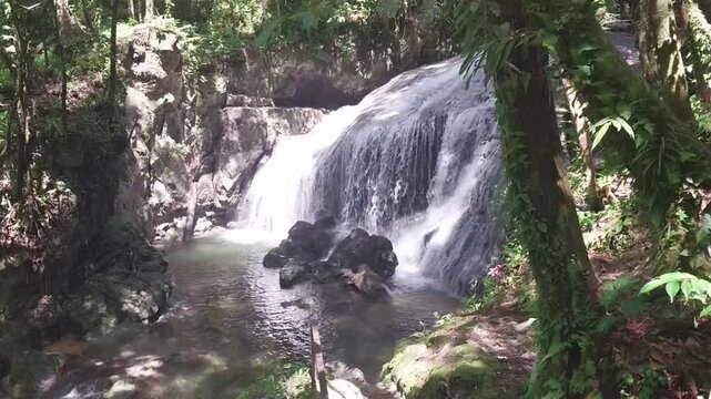 Serene Natural Water Cascade in Rural Biak Rainforest Papua