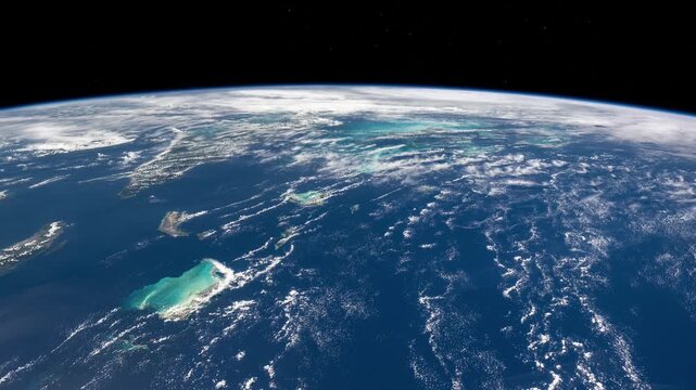Flying over Turks and Caicos Caribbean Sea with Earth curved horizon satellite view from space based on Nasa imagery