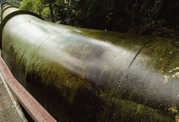 large pipeline carrying water from hydroelectric plant