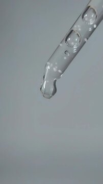 Liquid dripping from the tip of the serum pipette
