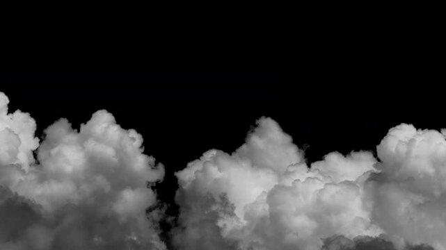 Time-lapse of multiple white clouds moving across a black background.