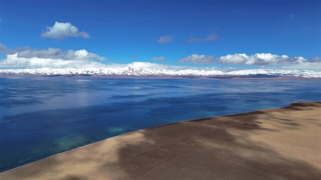 Aerial View Of Song Kol Lake In Autumn With Snowy Mountains