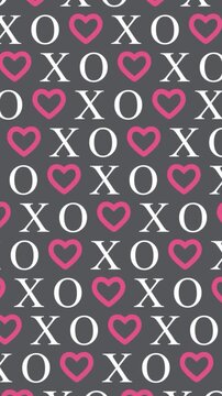 XO Hearts Pattern on Dark Gray Background stock photo