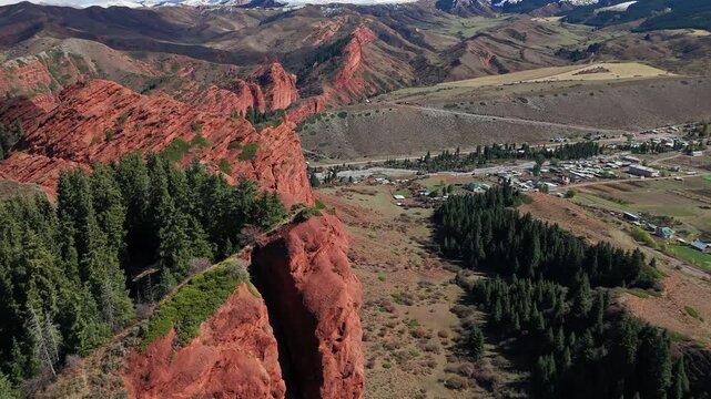 Mountain Village Beside Red Canyon Ridge Drone View