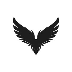 Obraz premium Black silhouette of bird wings spreading against a bright white background