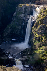 Scenic Waterfall in Natural Canyon Landscape
