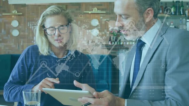 Advisor tapping tablet pointing, guiding client on business data with map HUD growing over tablet