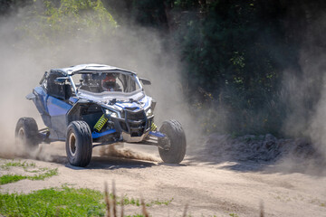 UTV buggy, 4x4 competition on dusty road. Rally, extreme, adrenalin © Antonio