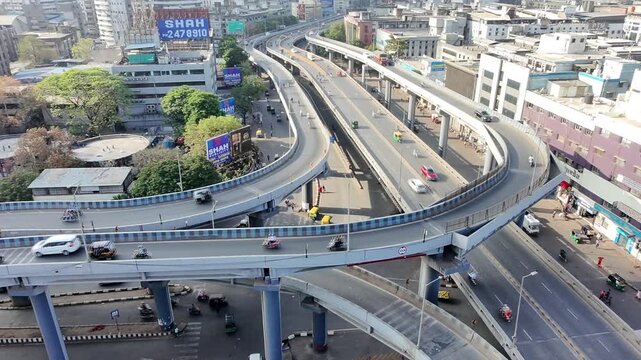 Aerial Drone View of Busy Highway Interchange with Traffic and Billboards in Surat City India