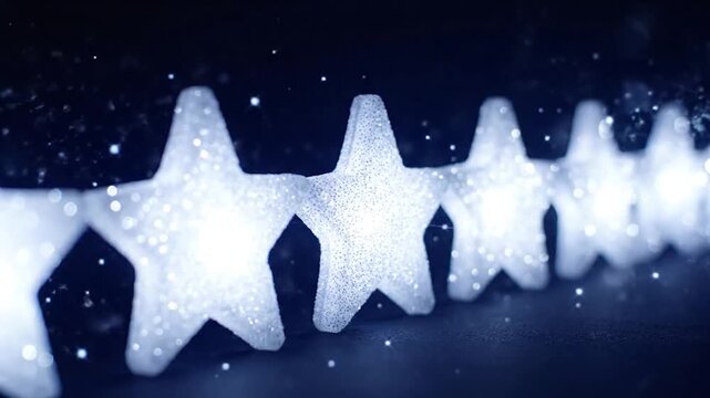 A row of glowing white star-shaped lights against a dark blue background, with sparkly effects
