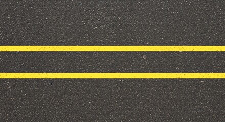 Two parallel yellow lines painted on a dark asphalt road surface