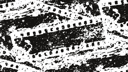 Old vintage film strips scattered randomly grayscale nostalgic film reel background