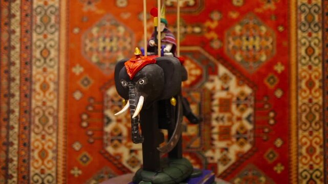 Black mechanical elephant of the Indian astrologer, an antique toy