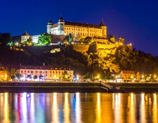Obraz premium Bratislava Castle at Night - A Majestic View of Slovakias Capital.