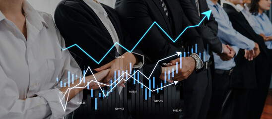 A team of business professionals stands together, analyzing financial data displayed through graphs and charts, highlighting trends and growth opportunities in a corporate setting. Scalp © InfiniteFlow