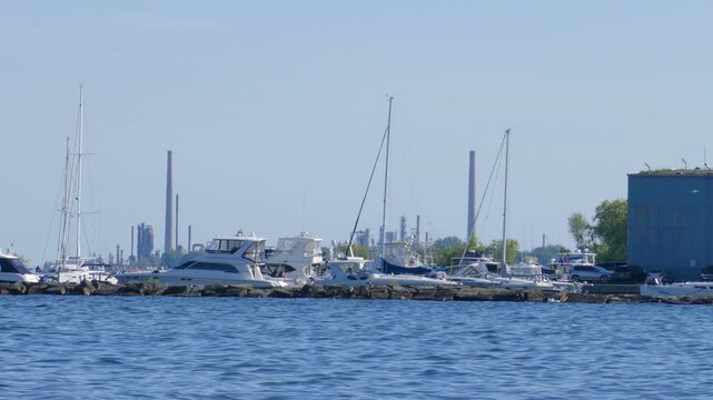 Boats in harbour at the mouth of the Credit River in Port Credit, Mississauga, Ontario, Canada on the north shore of Lake Ontario.