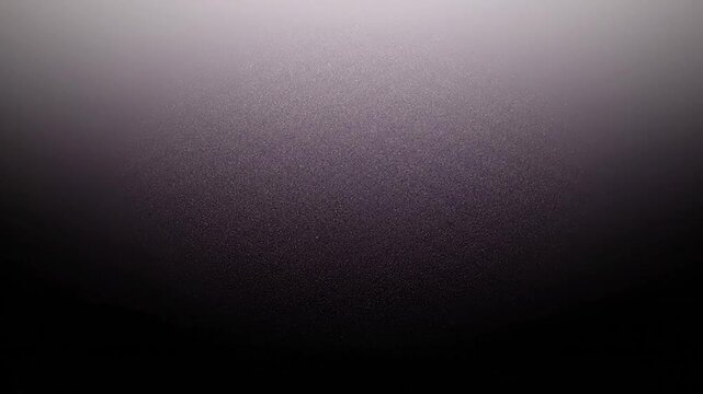 A textured gradient fades from light to dark, creating a nuanced, speckled surface