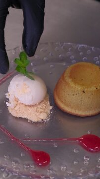 Delicious Chocolate Lava Cake souffle with Powdered Sugar and ice cream kitchen preparation High quality FullHD footage