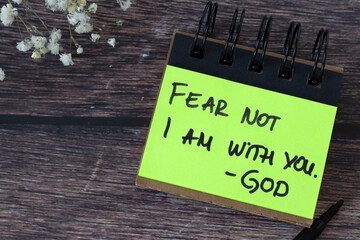 Fear not I am with you, God, inspirational Christian quote. Top view.
