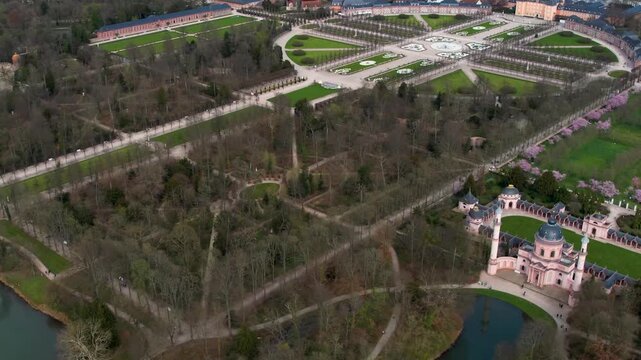 An panoramic aerial view beside the old town an palace of the city Schwetzingen in Germany on a sunny early spring morning during the cherry blossom season.
