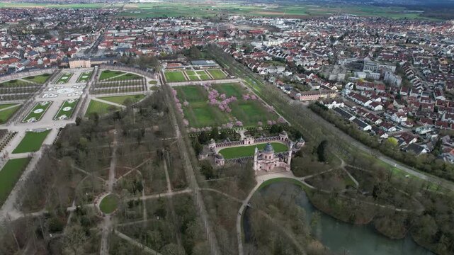 An panoramic aerial view beside the old town an palace of the city Schwetzingen in Germany on a sunny early spring morning during the cherry blossom season.