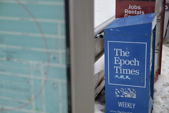 side of a newspaper box for The Epoch Times (Falun Gong), Broadview Av, Toronto