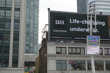 Obraz premium rooftop digital billboard sign (for underwear by Saxx available at Simons clothing shop), Sankofa Square, Toronto (southwest section)