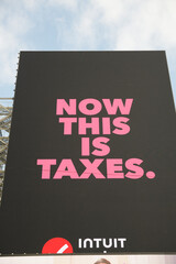 Naklejka premium digital billboard advertising for Intuit with catchy slogan: 