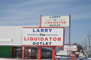 Naklejka premium ghost signs outside Larry the Liquidator at 1400 Victoria Park, Toronto