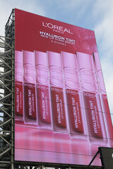 Obraz premium electronic billboard advertising for L'Oréal (cosmetics) facing Sankofa Square, Toronto