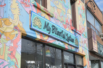 Naklejka premium sign on the outside of My Blissful Lotus, a metaphysical supply store, located at 1600 Gerrard St E, Toronto