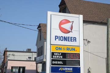 Obraz premium road side pylon sign at Pioneer gas station located at 2185 Gerrard St E, Toronto