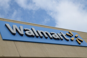 Naklejka premium skyward view of a Walmart department store sign on the exterior of Gerrard Square Shopping Centre, 1000 Gerrard St E, Toronto