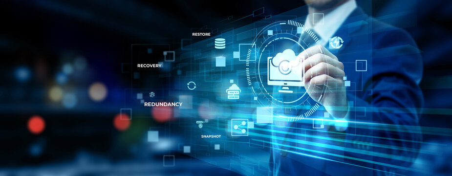 Businessman pointing at data backup technology on futuristic digital interface screen, cloud storage solution, cybersecurity protection, disaster recovery system, information security concept