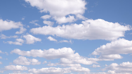 Obraz premium heaven skies blue and clear, with thin, puffy, transparent clouds. and moon is visible through them. sun shines brightly, making sky even brighter. scene is peaceful and serene