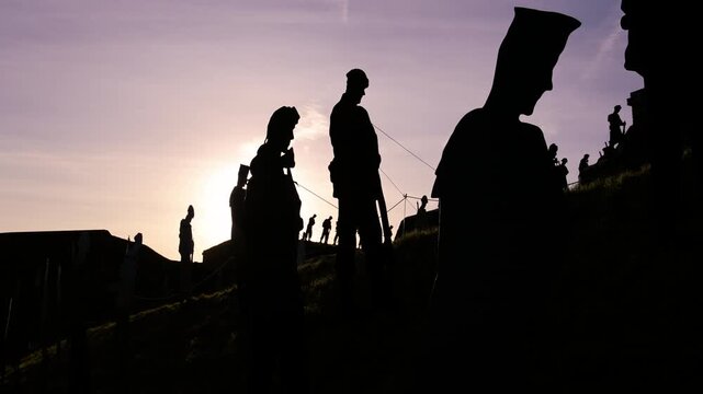 Soldier Silhouettes Standing Guard at Sunset