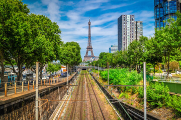 Obraz premium Eiffel Tower with moden houses raiload, Paris, France