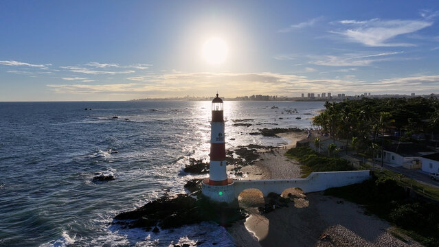 Sunset Lighthouse At Salvador In Bahia Brazil. Sunset Landscape. Itapua Lighthouse. Travel Destinations. Sunset Lighthouse In Salvador In Bahia Brazil. Nature Seascape.