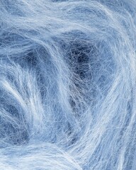 Obraz premium Mohair yarn texture, loose knit with long silky fibers, fuzzy and airy, light blue color