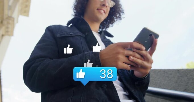 Man holding phone on steps tapping after first like, social likes floating near hands tracking rise