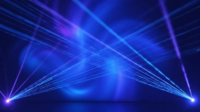 Blue and purple laser beams intersect and emanate from two points, creating a vibrant, luminous spectacle