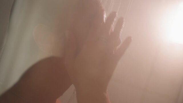 Tranquil bathing scene. Peaceful silhouette of relaxing shower with mist and tranquility. Serene bathroom scene capturing peaceful moments in quiet hotel shower with steam and reflection