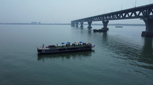 Aerial view of Padma bridge, Houseboat, over the Padma river, Bangladesh