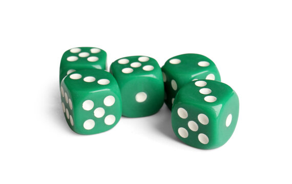 Many green game dices on white background