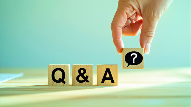 Hand placing question mark block on Q&A wooden blocks on a table, 41.jpg reference