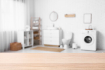 Empty wooden table in restroom, closeup