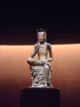 Bodhisattva in pensive position in Museum Gallery